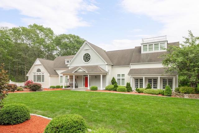 360 New London Tpke, Stonington, CT 06378 - shingle-style home featuring a front yard, a porch, and roof with shingles