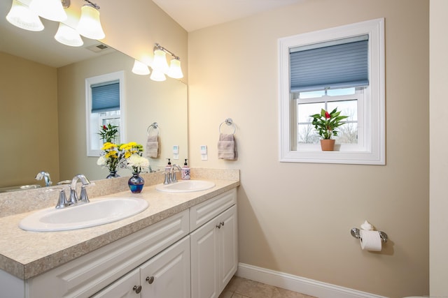 36 Barbers Way Unit 36, Hebron, CT 06248 - bathroom featuring baseboards, tile patterned flooring, double vanity, and a sink