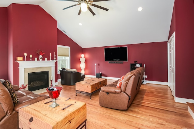 36 Barbers Way Unit 36, Hebron, CT 06248 - living room featuring baseboards, a ceiling fan, a fireplace with flush hearth, and light wood-style flooring