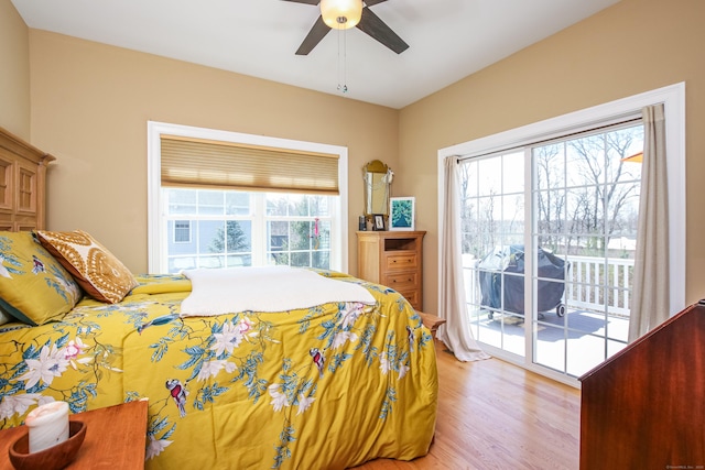 36 Barbers Way Unit 36, Hebron, CT 06248 - bedroom with light wood finished floors, a ceiling fan, multiple windows, and access to outside