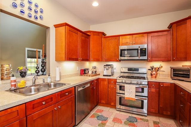 36 Barbers Way Unit 36, Hebron, CT 06248 - kitchen with appliances with stainless steel finishes, a toaster, light countertops, and a sink