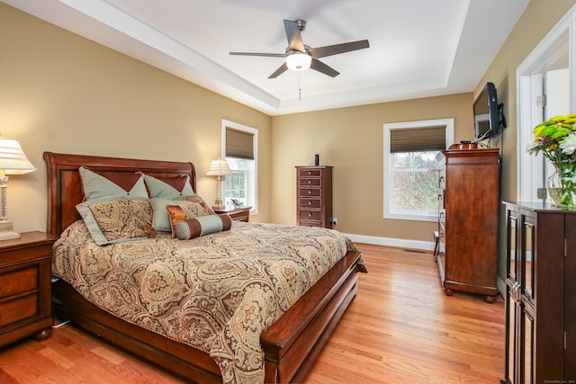 36 Barbers Way Unit 36, Hebron, CT 06248 - bedroom featuring light wood finished floors, ceiling fan, baseboards, and a tray ceiling