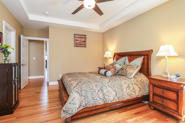 36 Barbers Way Unit 36, Hebron, CT 06248 - bedroom featuring a ceiling fan, baseboards, a raised ceiling, and light wood-type flooring