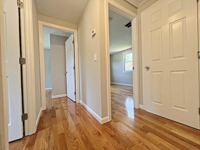 6 Perron Rd, Plainville, CT 06062 - hallway featuring light wood-style floors and baseboards