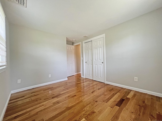 6 Perron Rd, Plainville, CT 06062 - unfurnished bedroom featuring light wood finished floors and a closet
