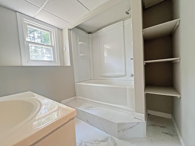 6 Perron Rd, Plainville, CT 06062 - full bathroom with marble look tile flooring, vanity, bathtub / shower combination, and a drop ceiling