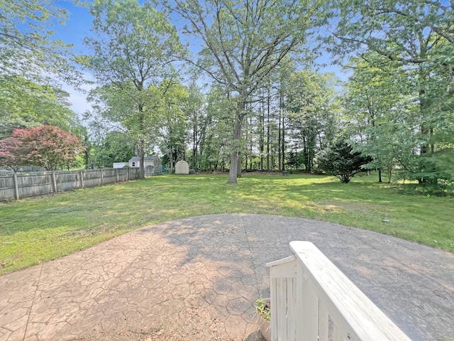 6 Perron Rd, Plainville, CT 06062 - view of yard featuring a patio and view of scattered trees