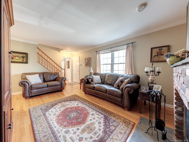 20 Copper Hill Dr Unit 20, Guilford, CT 06437 - living room featuring light wood-style flooring, crown molding, and stairway