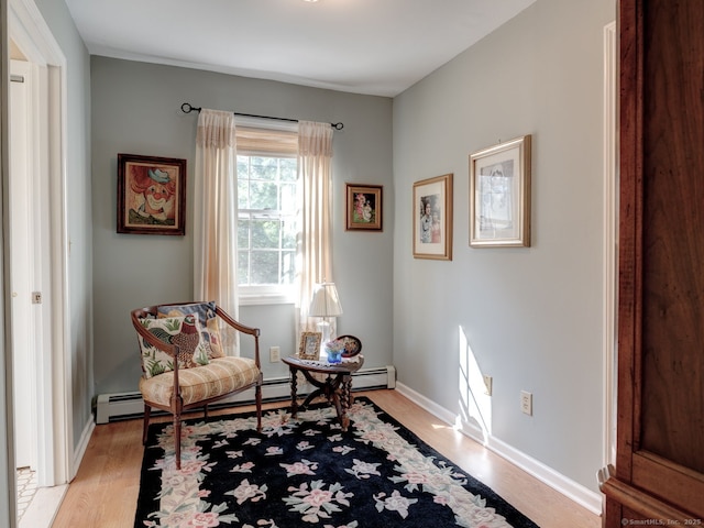 20 Copper Hill Dr Unit 20, Guilford, CT 06437 - sitting room featuring baseboards, light wood-style floors, and a baseboard heating unit