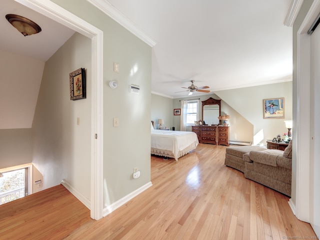20 Copper Hill Dr Unit 20, Guilford, CT 06437 - bedroom featuring crown molding, a baseboard heating unit, baseboards, ceiling fan, and light wood-style flooring