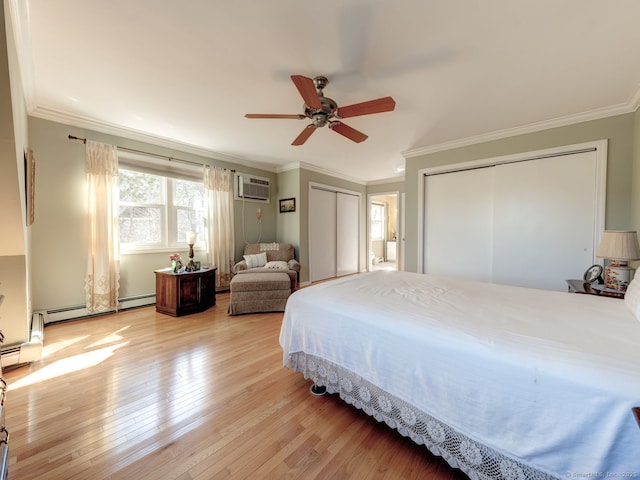 20 Copper Hill Dr Unit 20, Guilford, CT 06437 - bedroom with multiple closets, crown molding, a ceiling fan, baseboard heating, and light wood-style floors