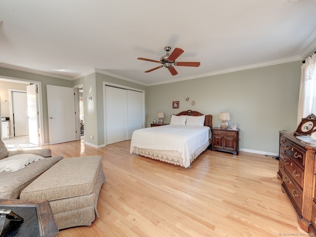 20 Copper Hill Dr Unit 20, Guilford, CT 06437 - bedroom featuring light wood-style flooring, ornamental molding, baseboards, and a closet