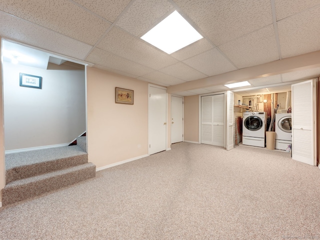 20 Copper Hill Dr Unit 20, Guilford, CT 06437 - finished below grade area featuring baseboards, stairs, light carpet, washer and dryer, and a paneled ceiling