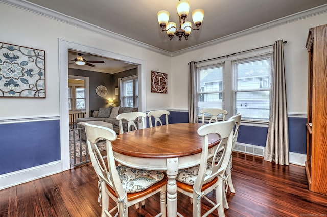 dining area with baseboards, visible vents, crown molding, and wood finished floors