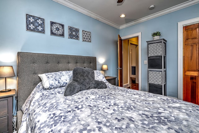 bedroom featuring recessed lighting and ornamental molding