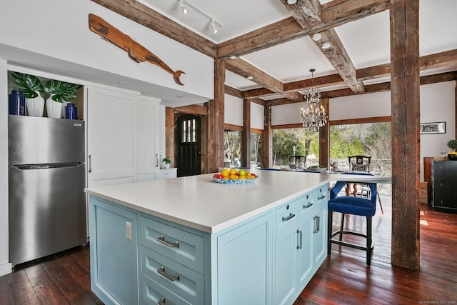 5 Deerfield Rd, Wilton, CT 06897 - kitchen featuring freestanding refrigerator, dark wood-style floors, a chandelier, light countertops, and beamed ceiling