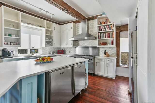 5 Deerfield Rd, Wilton, CT 06897 - kitchen featuring open shelves, wall chimney exhaust hood, a sink, appliances with stainless steel finishes, and dark wood-type flooring