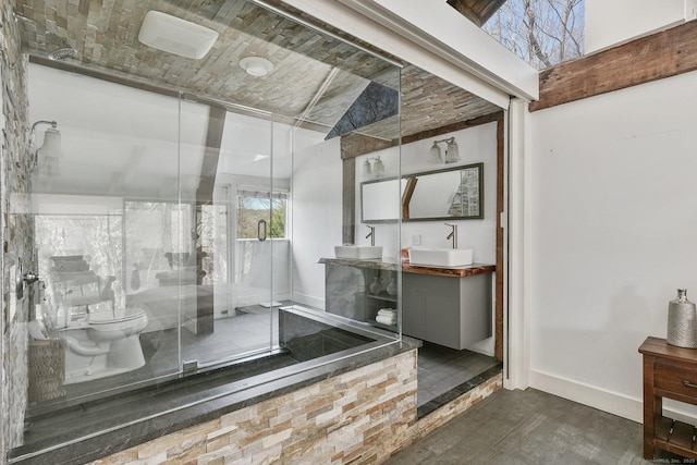 5 Deerfield Rd, Wilton, CT 06897 - full bath featuring a shower stall, toilet, vanity, and baseboards