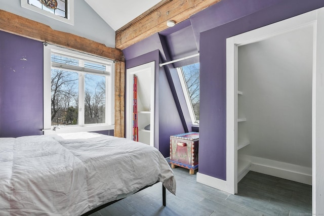 5 Deerfield Rd, Wilton, CT 06897 - bedroom with lofted ceiling, multiple windows, wood finished floors, and baseboards