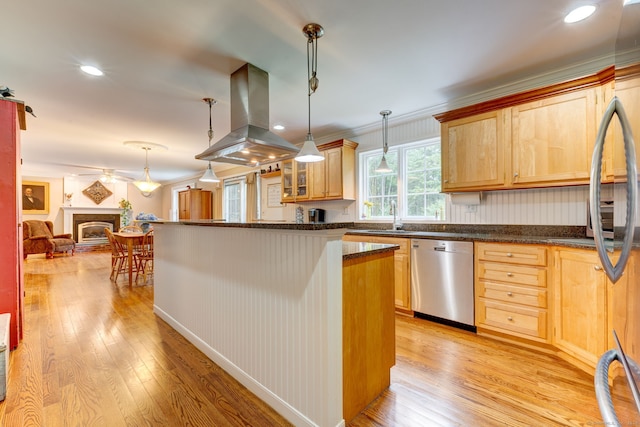 2 Whispering Pines Ln, Goshen, CT 06756 - kitchen with stainless steel dishwasher, crown molding, island range hood, and light wood-style flooring