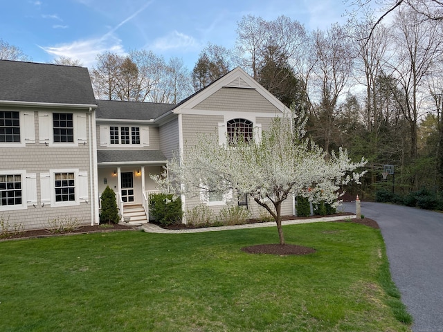 2 Whispering Pines Ln, Goshen, CT 06756 - traditional home with roof with shingles and a front yard