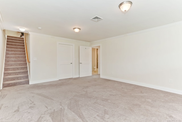 unfurnished room with crown molding, visible vents, stairway, carpet flooring, and baseboards