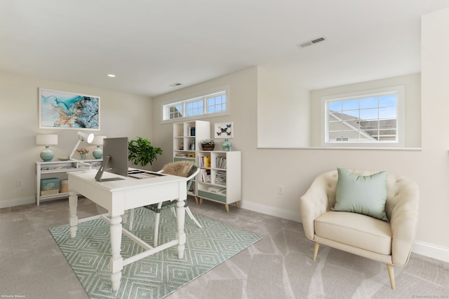 carpeted office space with baseboards, visible vents, and recessed lighting