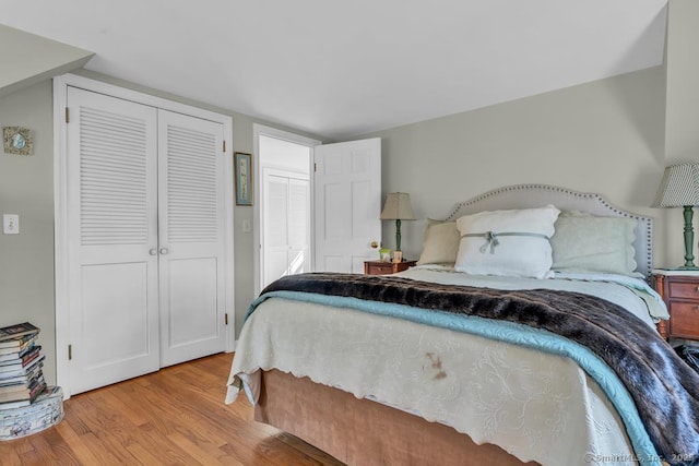 bedroom with wood finished floors