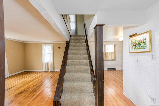 95 Vista Dr, East Haven, CT 06512 - staircase featuring visible vents, baseboards, and wood finished floors