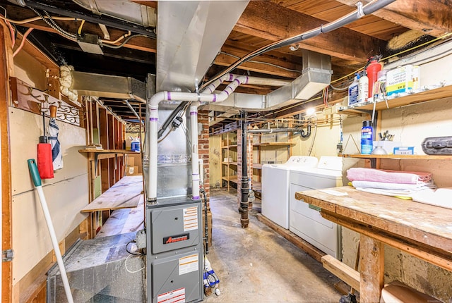 95 Vista Dr, East Haven, CT 06512 - unfinished basement featuring washer and dryer and a workshop area