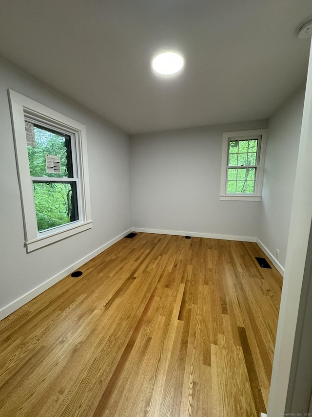 3 Topping Ln, Norwalk, CT 06854 - spare room with baseboards, light wood finished floors, and a smoke detector