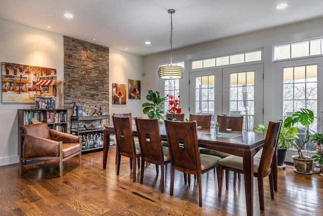 dining room featuring french doors, recessed lighting, and wood finished floors