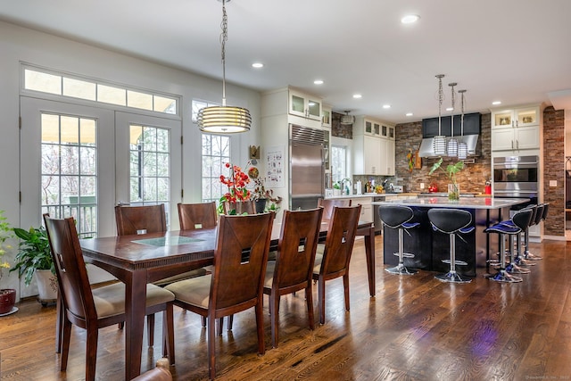 dining room featuring recessed lighting and dark wood-style flooring