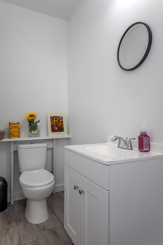 half bath with toilet and vanity