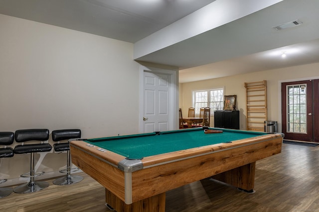 game room with visible vents, wood finished floors, and billiards