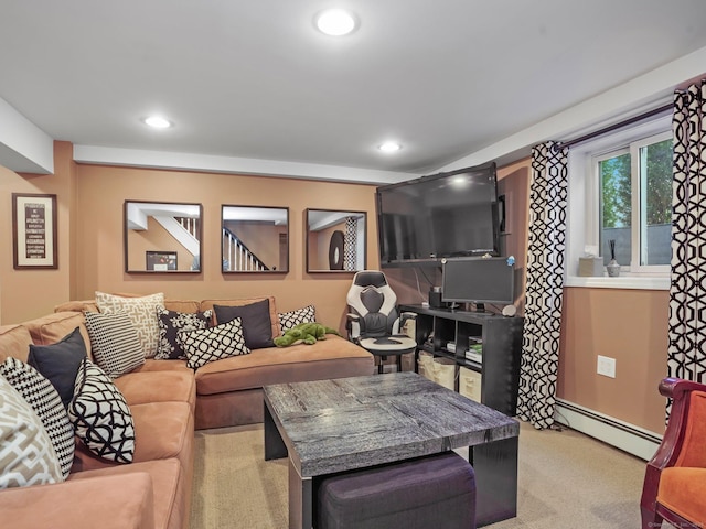 living area featuring a baseboard radiator, light carpet, and recessed lighting
