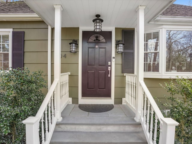 entrance to property with a porch