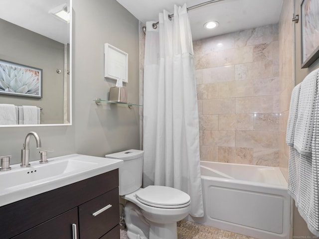 bathroom with toilet, shower / bath combo with shower curtain, recessed lighting, and vanity