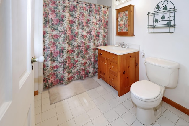 bathroom with a shower with curtain, baseboards, toilet, tile patterned floors, and vanity