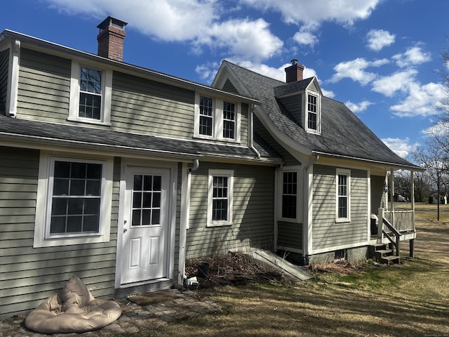 741 Mapleton Ave, Suffield, CT 06078 - back of property featuring a chimney