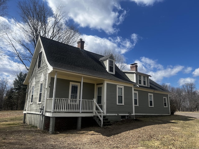 741 Mapleton Ave, Suffield, CT 06078 - view of front of property featuring a porch, a chimney, and a shingled roof