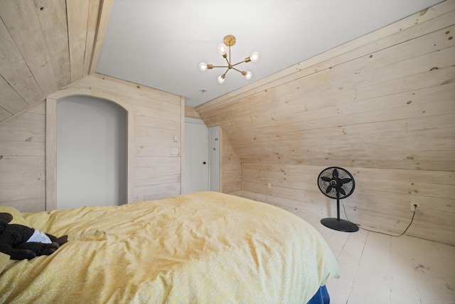 741 Mapleton Ave, Suffield, CT 06078 - bedroom with wooden walls, vaulted ceiling, a chandelier, and arched walkways