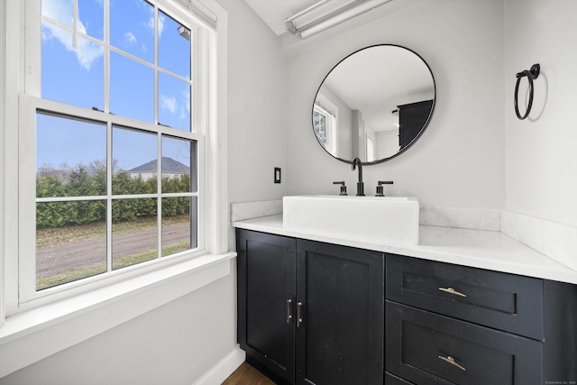 741 Mapleton Ave, Suffield, CT 06078 - bathroom with vanity and baseboards