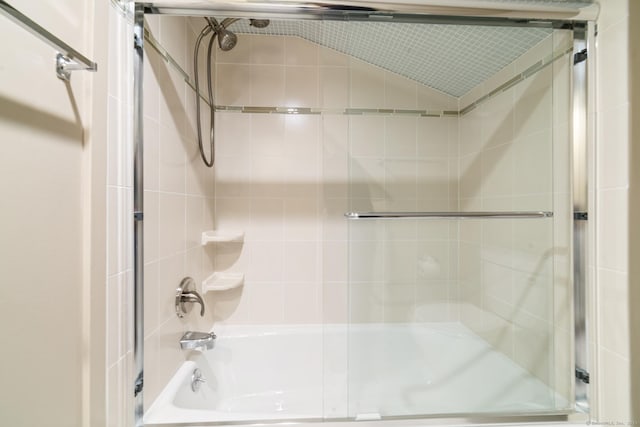 full bathroom featuring shower / bath combination with glass door