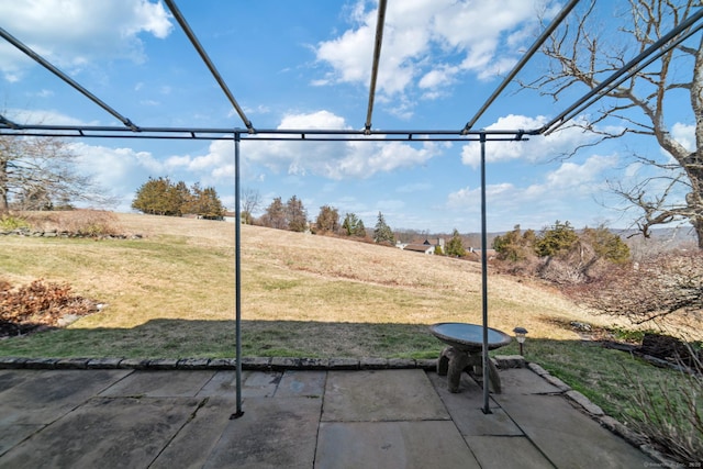 view of patio / terrace with glass enclosure