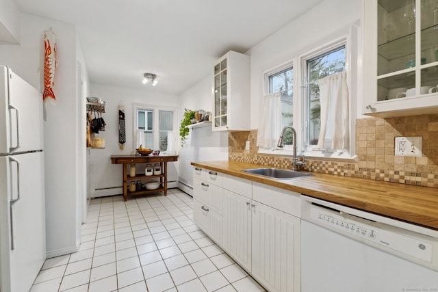 8 Lyle Ct Unit J, Farmington, CT 06032 - kitchen featuring white appliances, wooden counters, a sink, tasteful backsplash, and a baseboard heating unit
