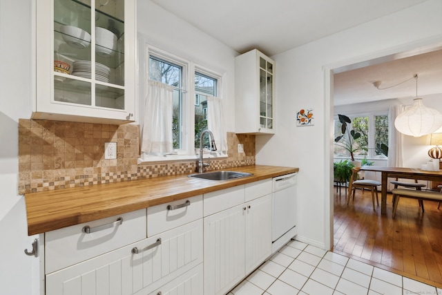 8 Lyle Ct Unit J, Farmington, CT 06032 - kitchen featuring wooden counters, dishwasher, a sink, and healthy amount of natural light