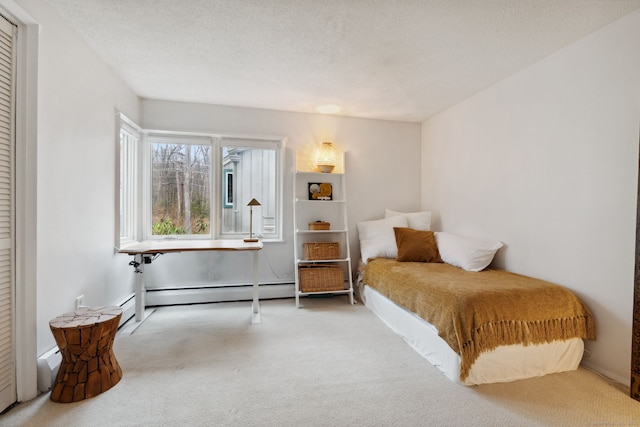 8 Lyle Ct Unit J, Farmington, CT 06032 - bedroom with carpet and a baseboard heating unit