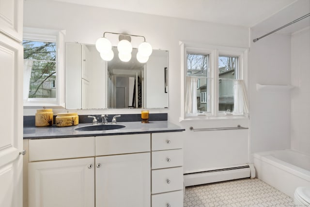8 Lyle Ct Unit J, Farmington, CT 06032 - full bath with baseboard heating, plenty of natural light, vanity, and  shower combination