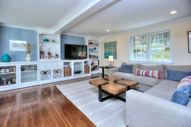 living room featuring crown molding, wood finished floors, wallpapered walls, and recessed lighting